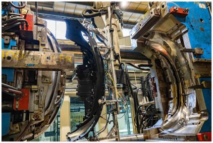 Indoor image of industrial machinery in a factory setting.