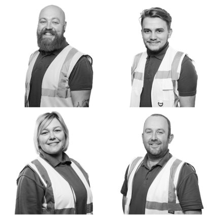 Black and white portraits of four people in reflective vests.